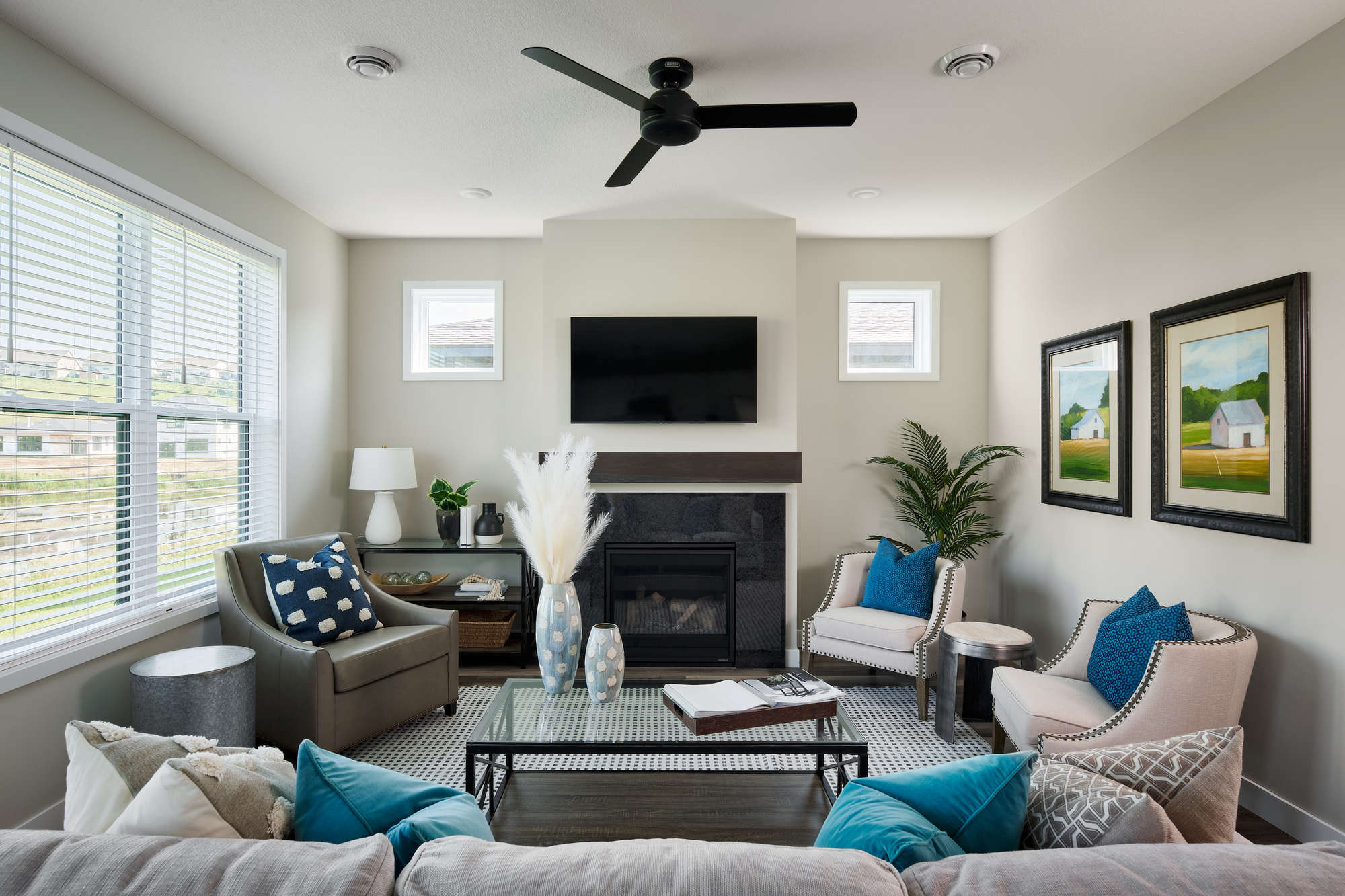 Modern living room with fireplace and decor.
