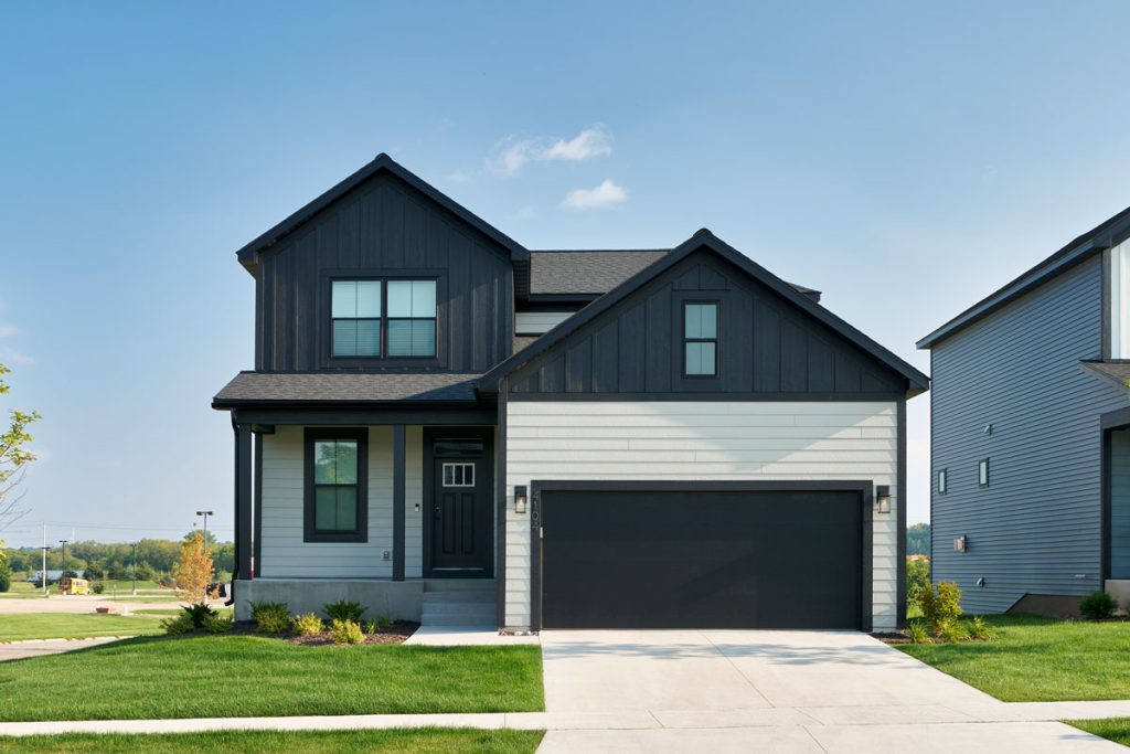 Modern suburban house with garage and lawn