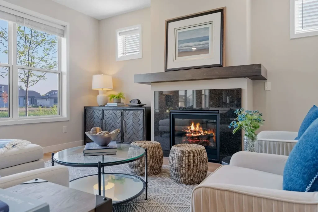 Cozy living room with fireplace and modern decor.